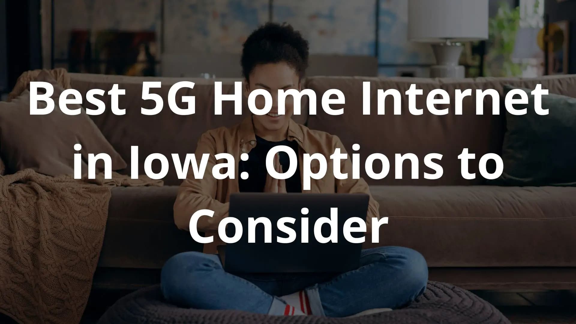 An individual reclining on a sofa, engrossed in a laptop, with the title "Best 5G Home Internet in Iowa: Options to Consider" overlaying the image.